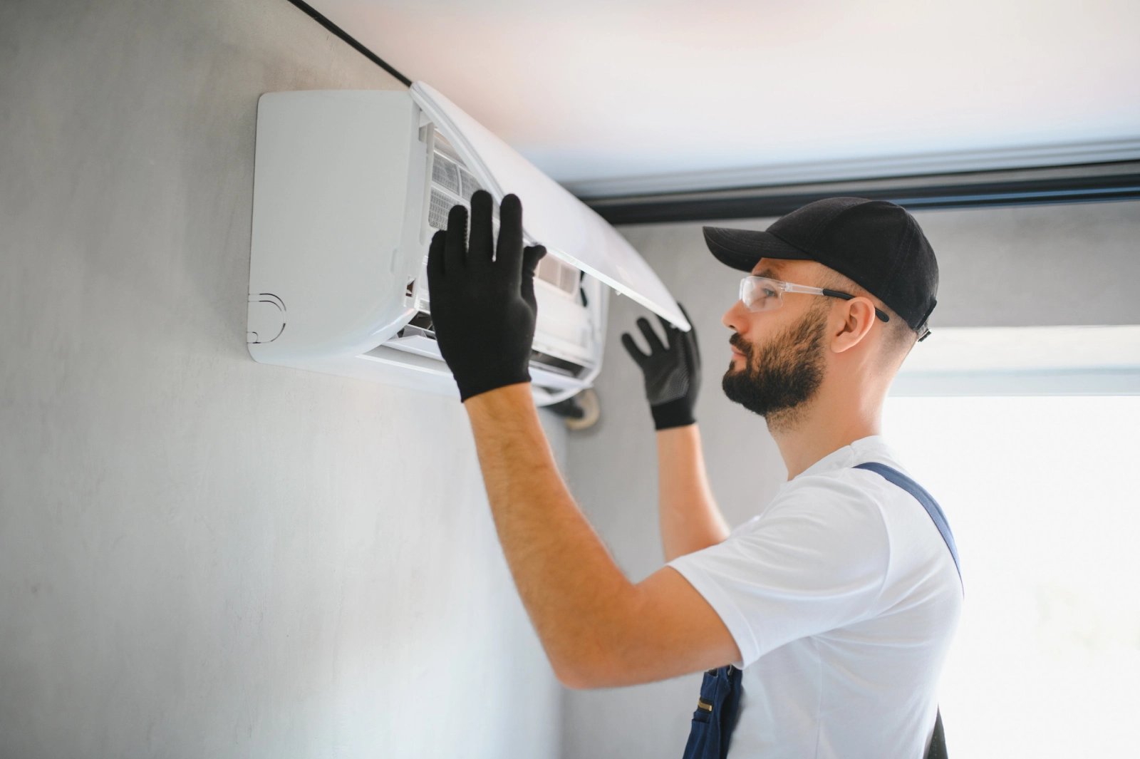 Male-technicians-service-for-repair-and-maintenance-of-air-conditioners